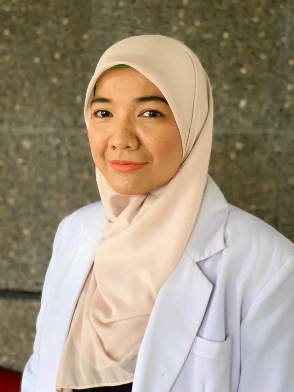 dr. Ade Rahmaini, M.Ked (Paru), Sp.P