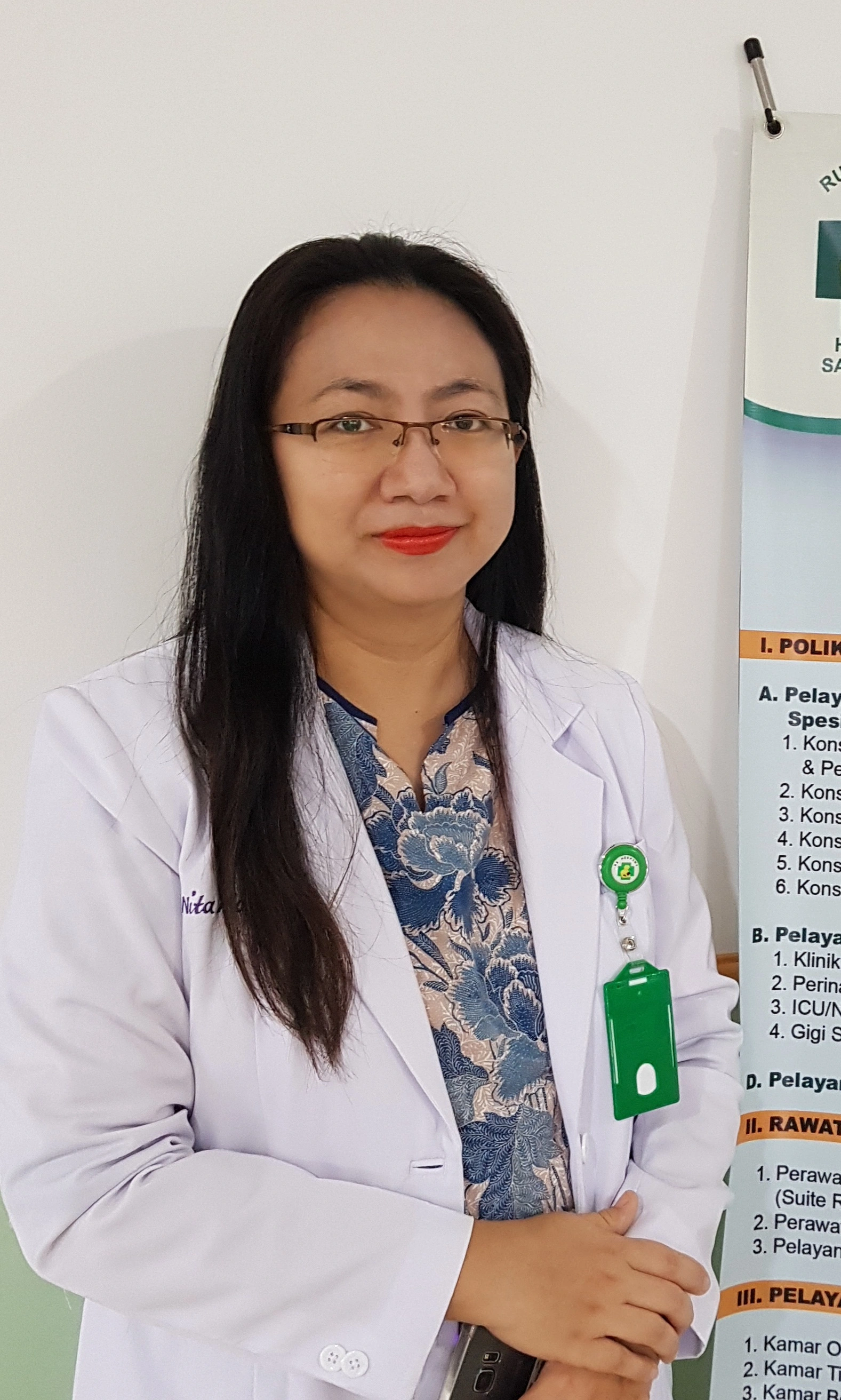dr. Sherly Yuniarchan, Sp.A