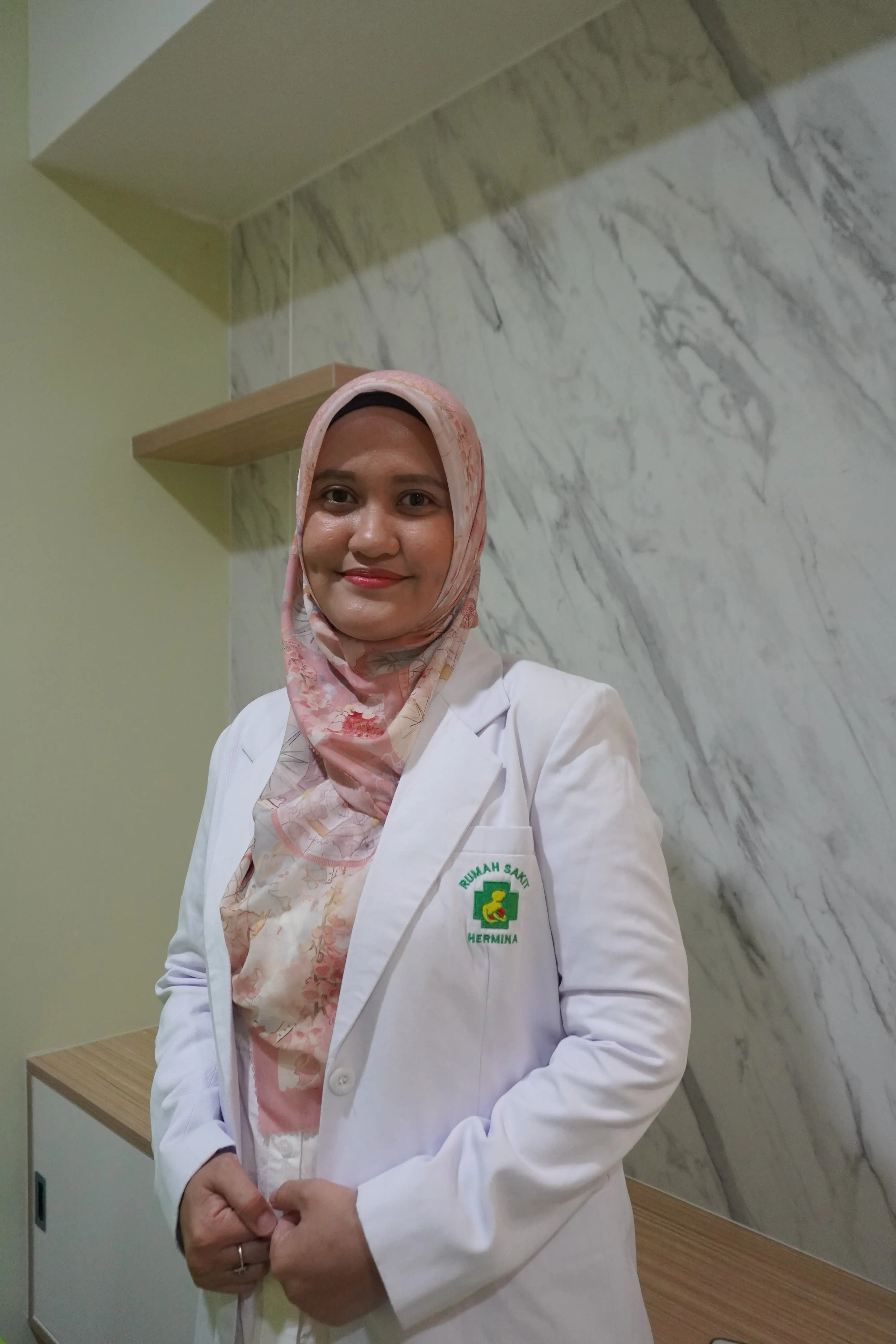 dr. Tri Novia Sari Putri, Sp. THT-KL
