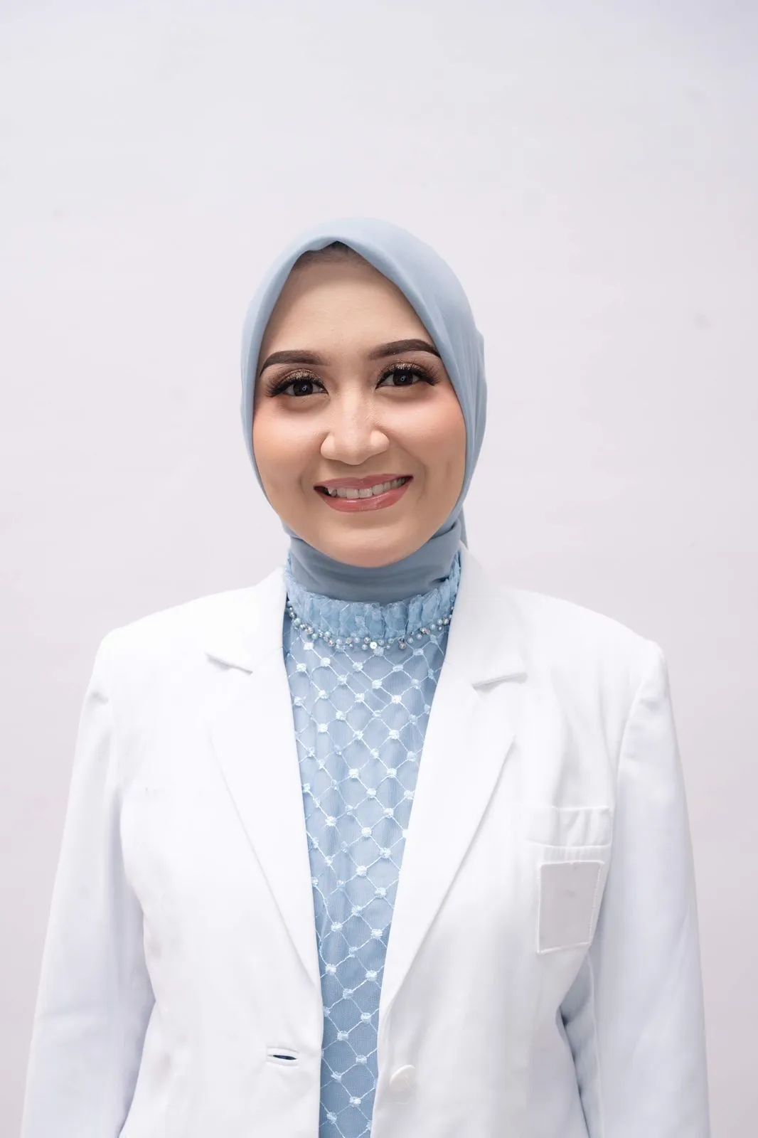 dr. Julita Melisa Dewi, Sp.THTBKL